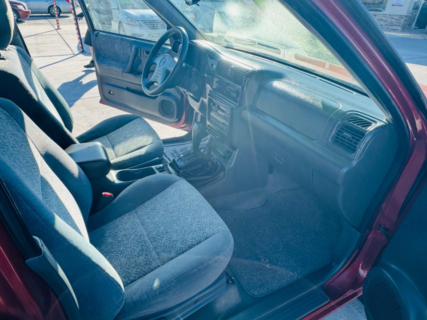 2000 Red Isuzu Rodeo LS , located at 2190 Hwy 95, Bullhead City, AZ, 86442, (928) 704-0060, 0.000000, 0.000000 - 2000 Isuzu rodeo LS. Automatic 4 wheel drive . Only 114k original miles v6. Brand new tires . Lots of upgrades . We finance - Photo#6